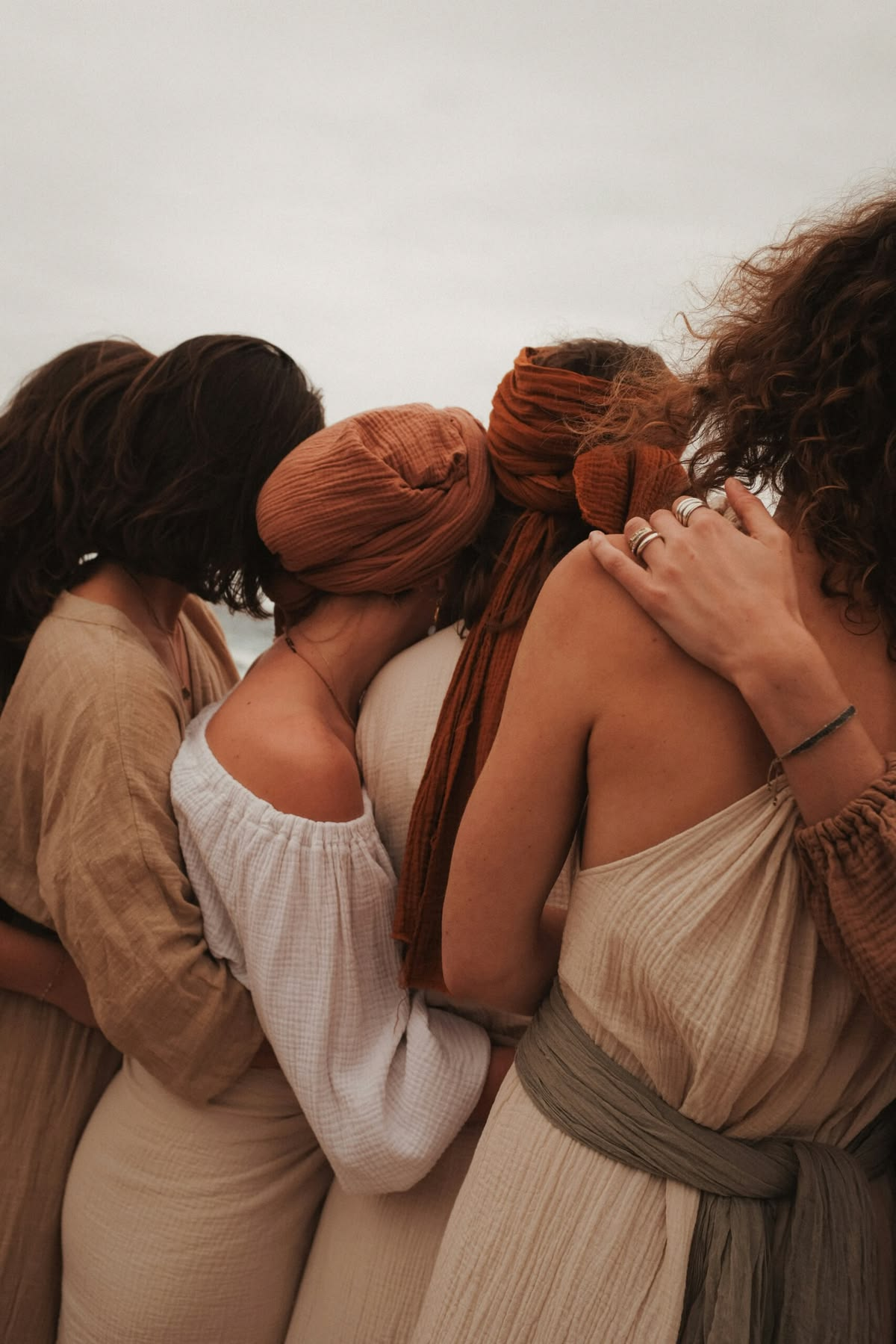 Women standing together in support of one another